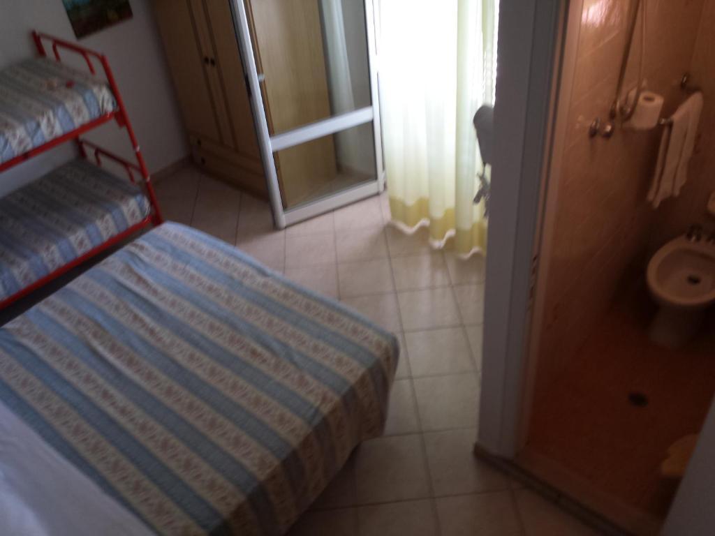Hotel Penny Rimini Pokoj fotografie